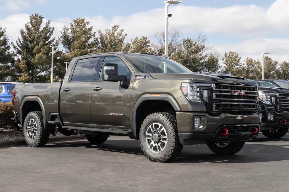 A GMC Sierra 2500 Crew Cab on display at a dealership, the kind of business-use pickup truck CBB Group arranges commercial vehicle financing for